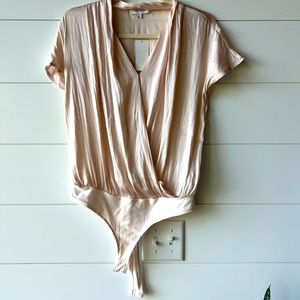 NWT BODY SUIT PALE PINK